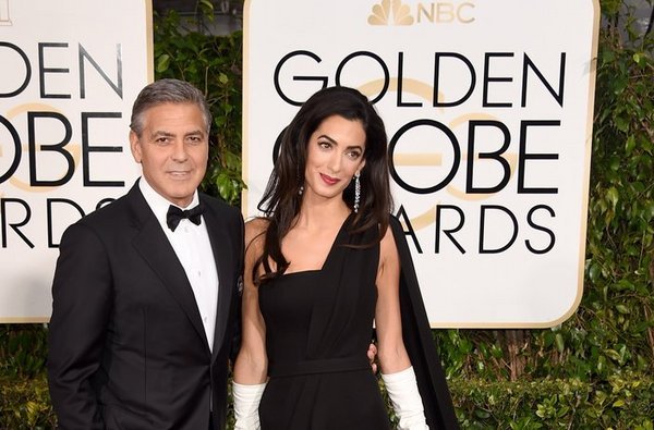 Los Clooney se unirán a marcha contra las armas