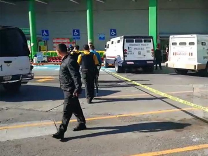 Intento de asalto a camioneta de valores deja heridos y un muerto