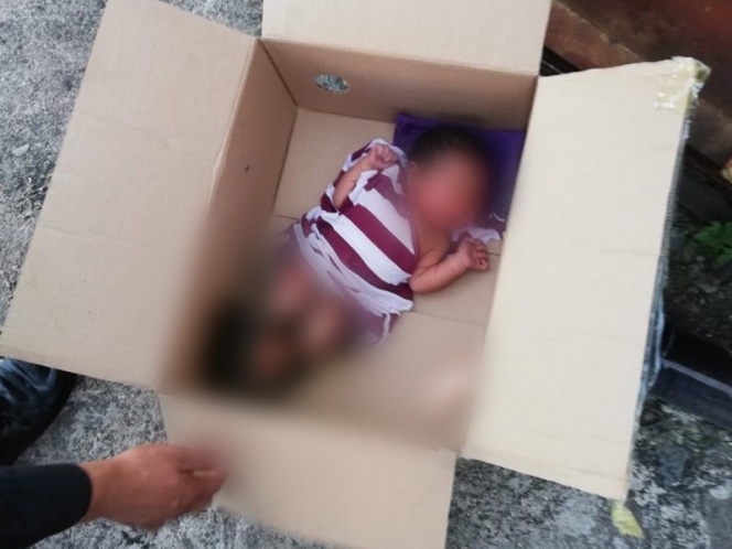 Abandonan a recién nacido en una caja de cartón